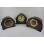 Three Art Deco Oak Mantel Clocks, To include an example by Smiths, 23cm high, (3)