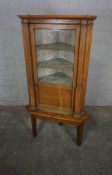 Oak Corner Cabinet, circa 19th century, Having a Glazed Door enclosing a Shelved interior, Raised on