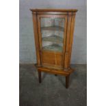 Oak Corner Cabinet, circa 19th century, Having a Glazed Door enclosing a Shelved interior, Raised on