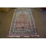 Persian Style Rug, Decorated with floral medallions on a pink ground, 190cm x 120cm