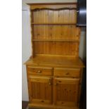 Modern Pine Dresser, Having open shelves above two small drawers and two cupboard doors, 172cm high,