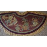 Tibet Rug, Decorated with parrots in foliage on an aubergine ground, 120cm x 35cm