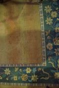 Chinese Style Carpet, Decorated with Floral medallions on an orange ground, 329cm x 240cm