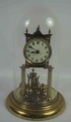 Brass 300 Day Clock, 22cm high, Under a Glass Dome Cover, With Key