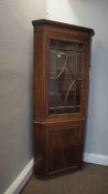 Mahogany Corner Cabinet on Base, circa 19th century, Having a Glazed Astragal Door enclosing a