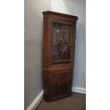 Mahogany Corner Cabinet on Base, circa 19th century, Having a Glazed Astragal Door enclosing a