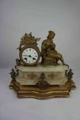 French Gilt Metal and Alabaster Mantel Clock, circa 19th century, Decorated with a Scholar next to