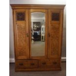 Victorian Walnut Wardrobe, Having a Mirrored Panel, Flanked with two Panelled Doors, Above two
