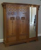 Attributed to Shapland & Petter of Barnstaple, Arts & Crafts Oak Three Door Wardrobe, Having a