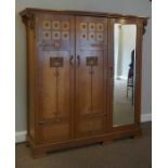 Attributed to Shapland & Petter of Barnstaple, Arts & Crafts Oak Three Door Wardrobe, Having a