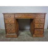 Oak Kneehole Desk, circa late 19th / early 20th century, Having a Single Drawer above Four Drawers