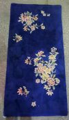 Chinese Style Rug, Decorated with Floral panels on a Blue ground, 185cm x 92cm