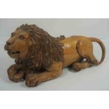 Carved Wood Figure of a Lion, 20cm high, 41cm wide