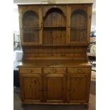 Pine Dresser, Having two Glazed Doors above three Drawers and three Doors, 189cm high, 133cm wide,