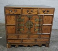 Korean Style Hardwood Collectors Chest, Having small fitted Drawers, Decorated with Brass mounts,
