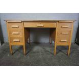 Vintage Oak Kneehole Desk, Having a Single Drawer flanked with three Drawers, 76cm high, 137cm wide,