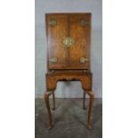 Queen Anne Style Walnut Cocktail Style Cabinet, Having two Doors enclosing a fitted Shelve above a