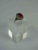 Ruby and Diamond Cluster Ring, Set with a Ruby Cabochon, Measuring approximately 1cm, With Diamond