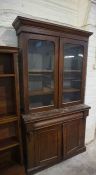 Victorian Mahogany Bookcase, Having two Glazed Doors enclosing a Shelved interior, Above two Doors