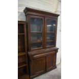 Victorian Mahogany Bookcase, Having two Glazed Doors enclosing a Shelved interior, Above two Doors