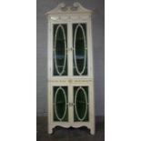 French Style Painted Corner Cabinet, Having two sets of two Glazed Doors, Enclosing a Shelved