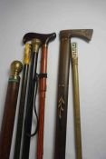 Six Walking Sticks, To include two examples with Japanese style Handles, Another example having a