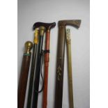 Six Walking Sticks, To include two examples with Japanese style Handles, Another example having a