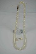 String of Cultured Pearls, Having a 9ct Gold Clasp, 20cm long, Also with a pair of Cultured Pearl