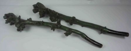 Two Green Painted Shillelaghs, 67cm, 69cm long, (2)