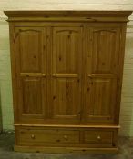 Pine Wardrobe, Having three Doors above two Drawers, 203cm high, 162cm wide, 57cm deep