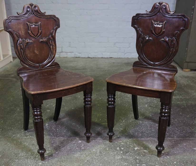 Pair of Victorian Mahogany Hall Chairs, Having a Carved Back Rest, Decorated with Scrolls and a