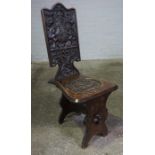 Carved Oak Hall Chair, circa 19th century, The Back Rest is carved with Griffins, Armorial Carved