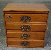 Stained Wood Collectors Chest, circa early 20th century, Having four Drawers enclosing a Velvet