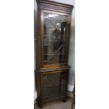 Mahogany Corner Cabinet, circa early 20th century, The two section Cabinet having two Glazed