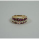 9ct Gold Ruby and Diamond Ladies Ring, Set with small Graduated Ruby and Diamond stones, Stamped