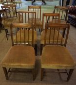 Harlequin Set of Seven Late Georgian Mahogany Dining Chairs, Having later Stuffover seats, Including