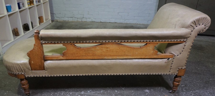 Oak Chaise Longue, circa early 20th century, Upholstered in later Rexine, Raised on Castors, 74cm - Image 5 of 5