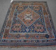 Persian Quashqai Rug, Decorated with Geometric Medallions on a Brown and Blue Ground, 210cm x 167cm
