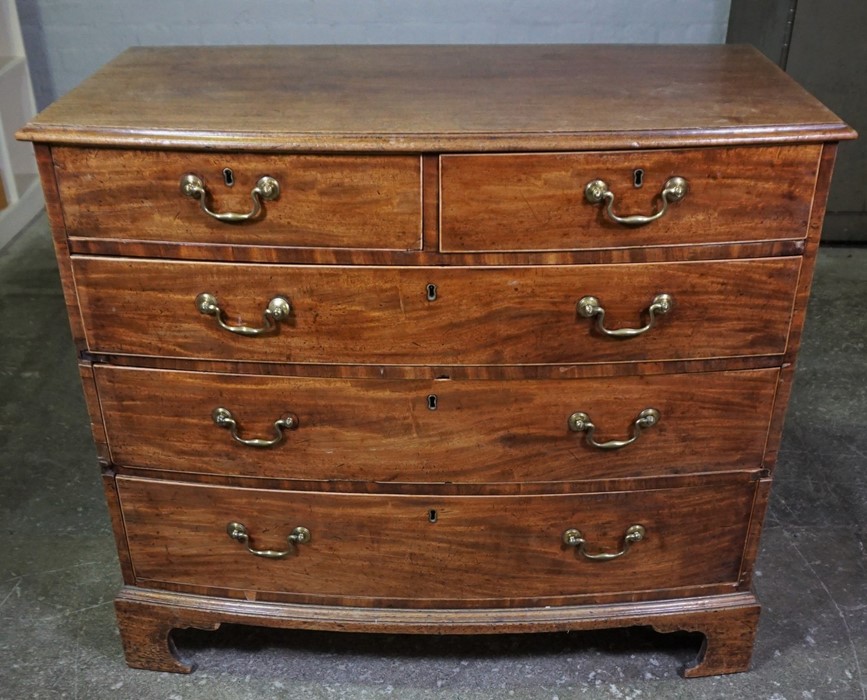 George III Mahogany Chest of Drawers, Having two small Drawers above three long Drawers, Raised on