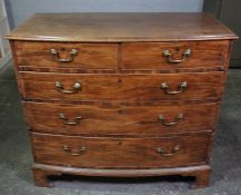 George III Mahogany Chest of Drawers, Having two small Drawers above three long Drawers, Raised on