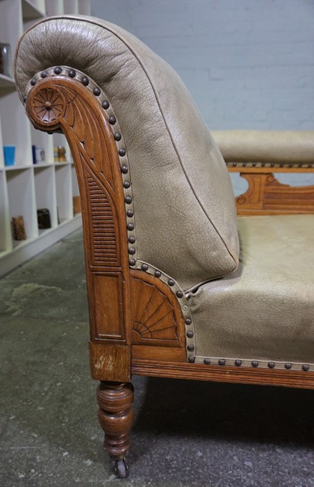 Oak Chaise Longue, circa early 20th century, Upholstered in later Rexine, Raised on Castors, 74cm - Image 4 of 5