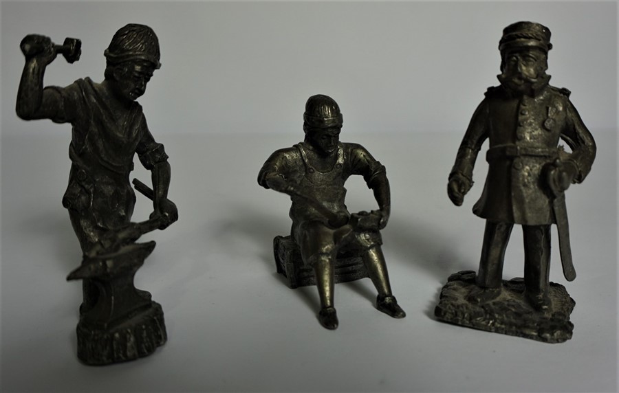 Metal Figure of a Metal Worker, Also with three small Metal Figures, To include a Blacksmith, And - Image 3 of 3