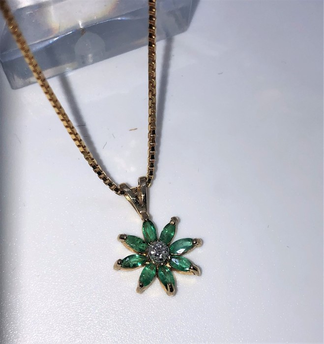 Gemstone and Diamond Ladies Flower Pendant, The Green Pendant is set with small Diamonds, On a 9ct
