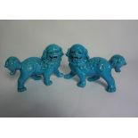 Pair of Chinese Blue Glazed Dog of Foe Figures, 13cm high, 24cm wide, (2)