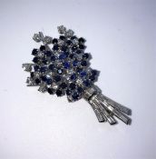 Sapphire and Diamond Spray Brooch, Set with approximately 20 Brilliant cut Diamonds, Measuring