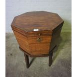 George III Mahogany Octagonal Wine Cooler, The Hinged Top enclosing a Metal and Lead lined interior,
