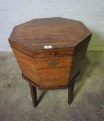 George III Mahogany Octagonal Wine Cooler, The Hinged Top enclosing a Metal and Lead lined interior,