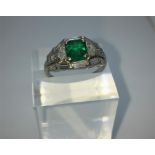 Art Deco Emerald & Diamond Ladies Ring, Set with an Octagonal cut Emerald, Flanked by a pair of half