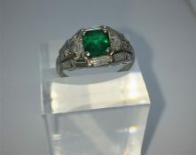 Art Deco Emerald & Diamond Ladies Ring, Set with an Octagonal cut Emerald, Flanked by a pair of half