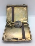 Silver Cigarette Case, Crested to the Obverse, 114 Grams, Also with a Silver Gilt Military Brooch,